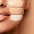 Foundation swatches compared side by side on skin